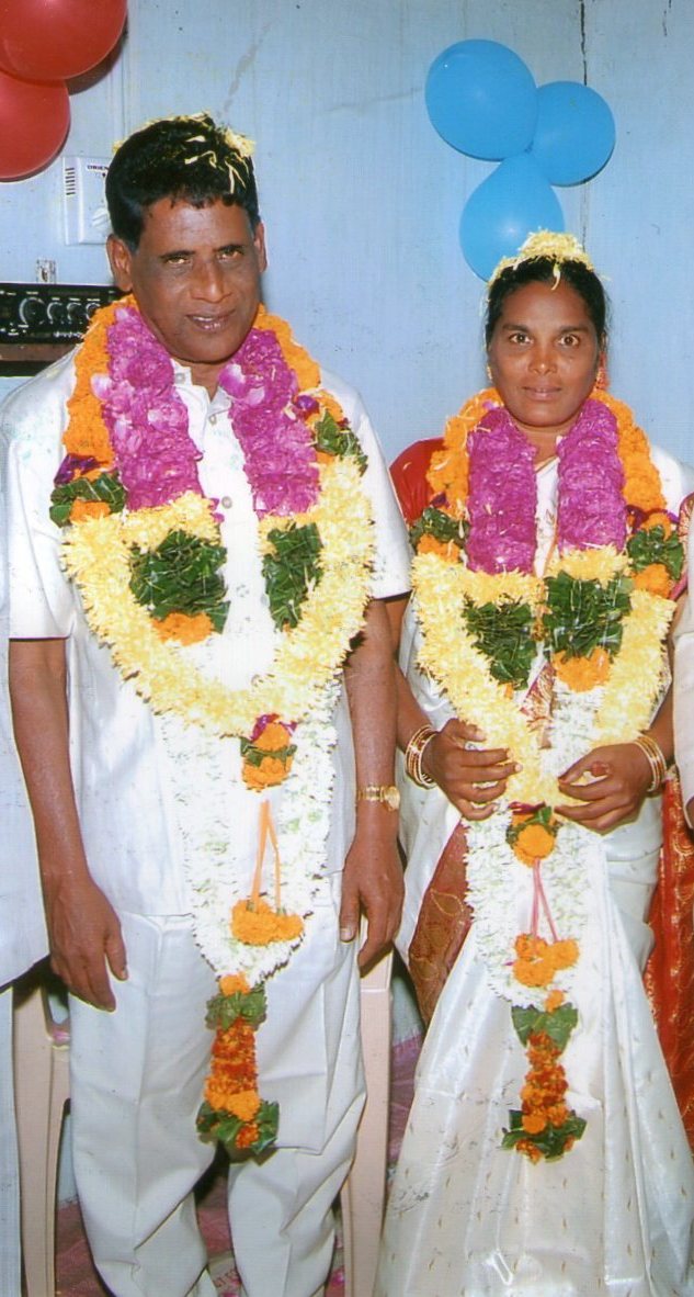 Indian elderly couple supporting each other